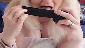 Working blonde amateur rides a large dildo while alone