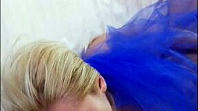 Odette frolics in bed with pussy play in blue.