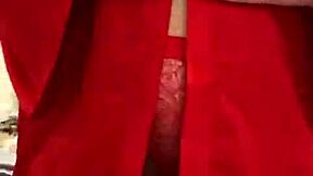 brunette in red lingerie plays with her big tits