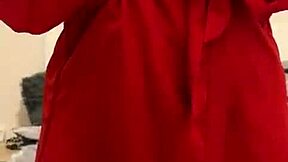 brunette in red lingerie plays with her big tits