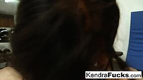 spinner beauty uses her mouth to work out a hard cock