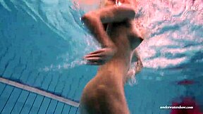russian brunette duna bultihalo bathing with firm big tits in red dress underwater in the pool