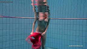 russian brunette duna bultihalo bathing with firm big tits in red dress underwater in the pool