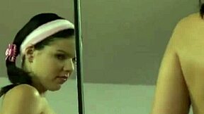 hot brunette shows her natural tits while masturbating with a dildo