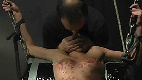 Bondage slave gagged and roughly drilled by master in garage