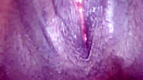 Young ebony teen fingers her wet pussy open