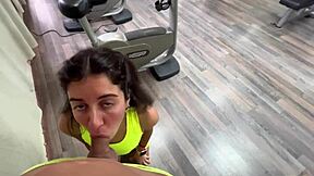 Risky public encounter in the gym involving sex and cum swallowing