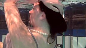 i watch katya okuneva bouncing her titss in a dress at the pool partyy