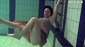 i watch katya okuneva bouncing her titss in a dress at the pool partyy