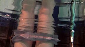 i watch katya okuneva bouncing her titss in a dress at the pool partyy