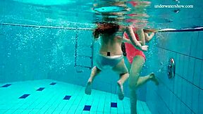 Hey, watch Avenna, Nina Mohnatka, and Marketa swim nude!