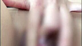 Amateur Japanese girl masturbates with big tits and ass on display.