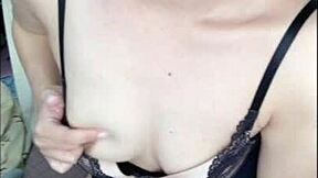 Amateur Japanese girl masturbates with big tits and ass on display.