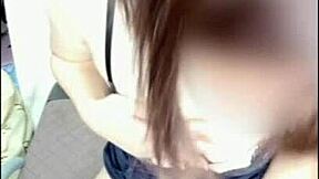 Amateur Japanese girl masturbates with big tits and ass on display.