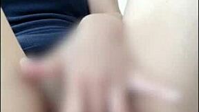 Amateur Japanese girl masturbates with big tits and ass on display.