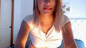 Is this hot blonde milf masturbating her shaved pussy?