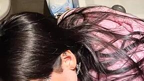 Latina gives blowjob in bathroom