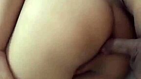 The neighbor was wearing a beautiful floral dress for the massage