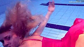 elena proklova looks so damn sexy alone by the pool in that tight dress. her tattoo just adds to the vibe.