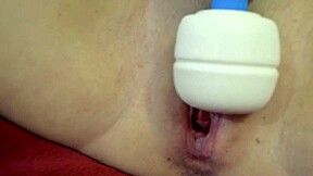 Redhead teen squirts hard from Hitachi orgasm.