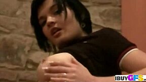 Hot brunette with big breasts enjoys some personal time.