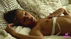 In her bedroom, young and sexy Roxana is satisfied with the help of a vibrator
