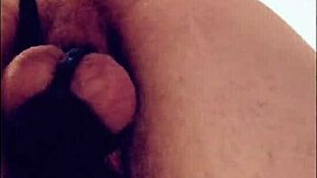 hey watch this teenage sissy stretching his hole with homemade toy in chastity