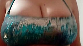 Heading to the beach in a revealing swimsuit, breasts accidentally exposed