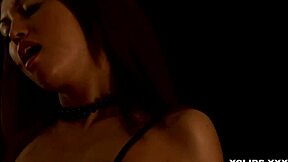 A classy Russian babe poses solo in fishnets and stockings