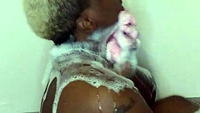 ebony wife enjoys fetish massage in bath with milf