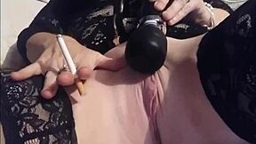 The Slutty Milf Suggestively Masturbates While Having A Smoke In Homemade Scene