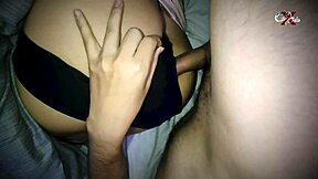 The brunette schoolgirl lies on the bed, waiting for her ass to be filled with cock