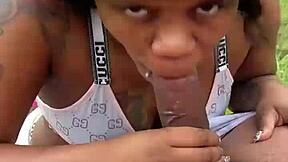 Girl sucks big black cock for pocket change.