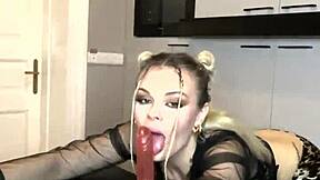 I am a skinny teen playing with red dildo in the kitchen for full video