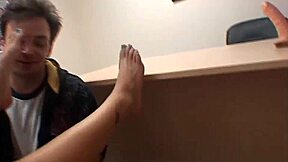 office babe gives footjob in threesome scene