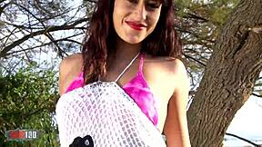 Nice teen Lucia Nieto strips on beach