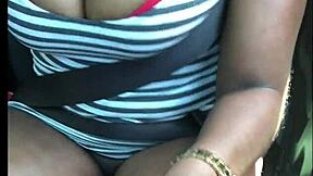 People engage in intense activity inside a car