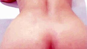 Young couple shows off in motel bathtub