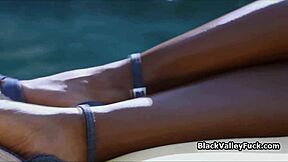 Black bikini babe handles massive cock with skill