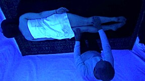 Gigi Breeze does blacklight massage.