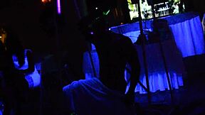 Can This Glowing Male Stripper Handle Bent-Over Milfs in a Public Orgy?