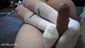 Miley Grey Delivers Intense Footjob in Long Socks