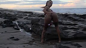 just cumming hard on the beach with her