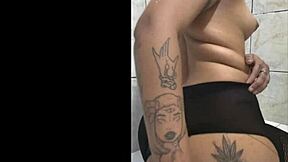 tattooed submissive plays with anal dildo and drinks pee