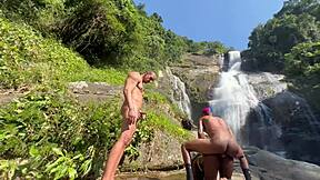 Pretinha gets fucked outdoor at the waterfall