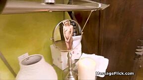 Filming a massage session with a hot blonde