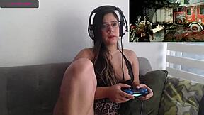 Sexy latina fingering herself during video game