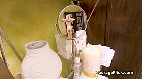 Filming a massage session with a hot blonde