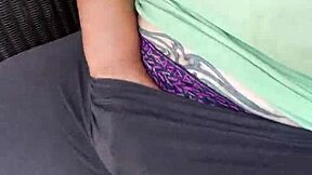 Young girl plays with her feet playfully