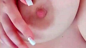 busty beauty teases her big nipples on camera while parents sleep nearby